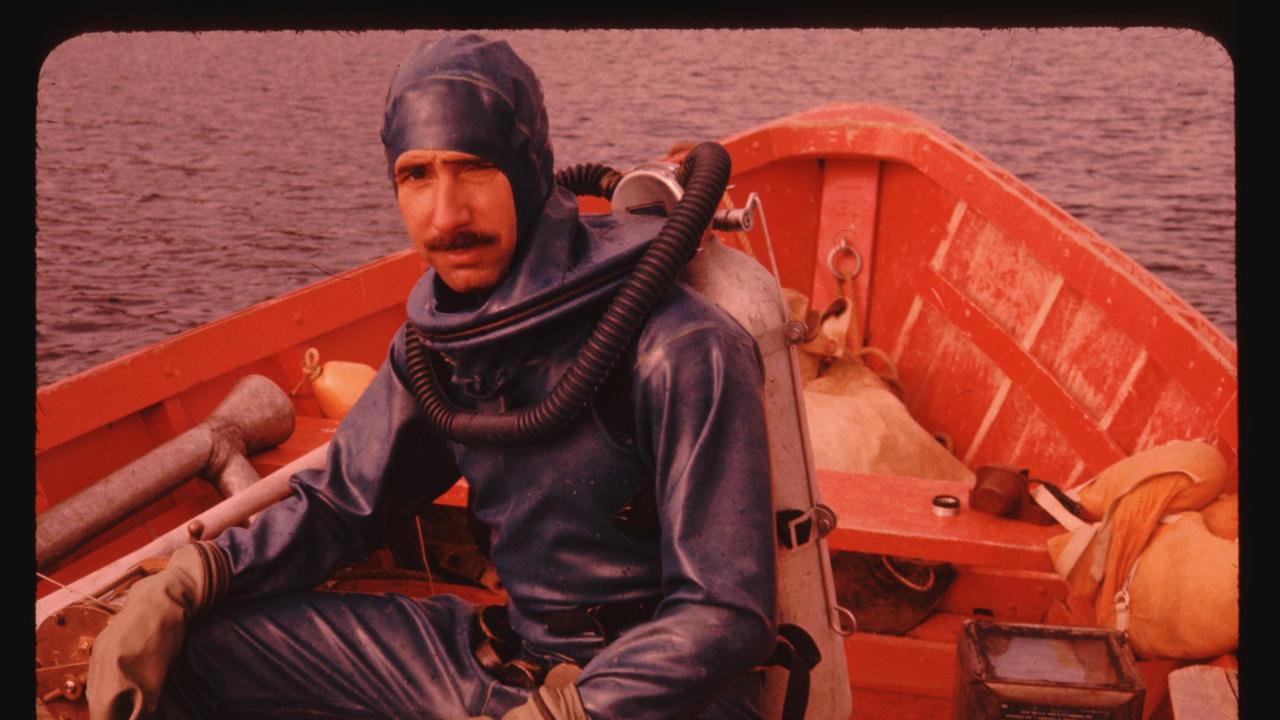 Dr. Goldman getting ready to scuba dive on Lake Tahoe