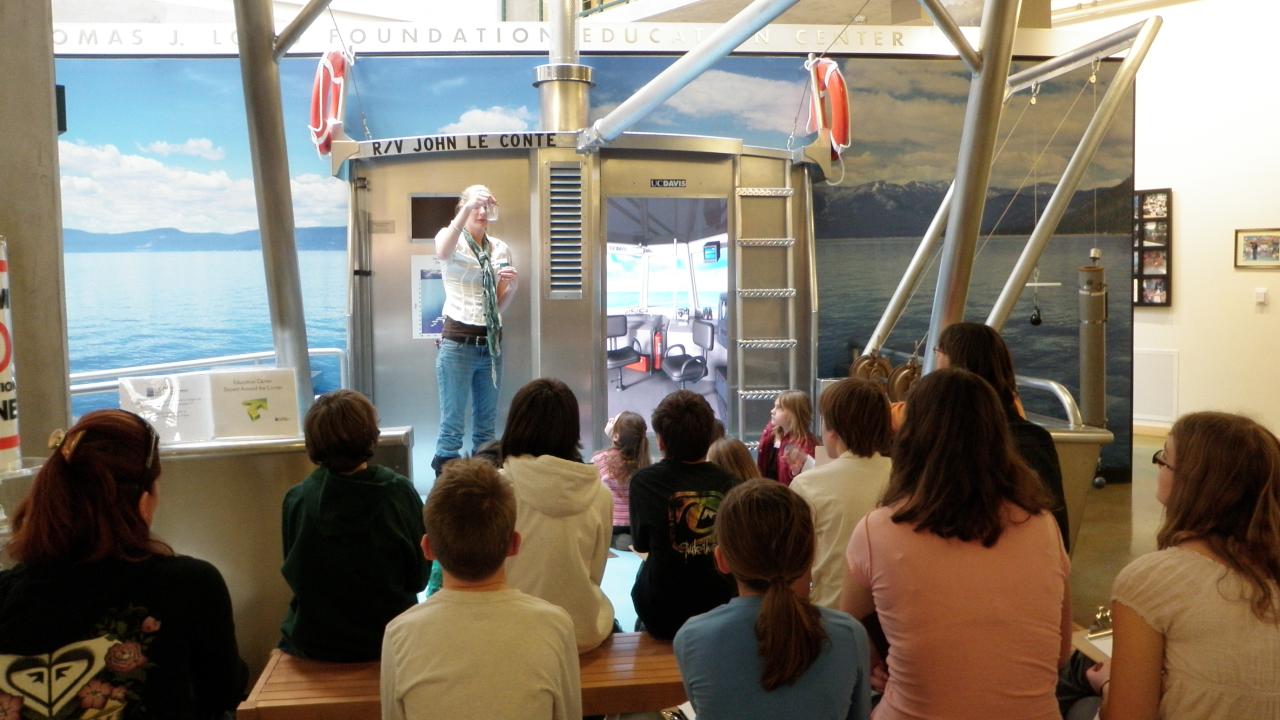 Students listen to lecture on the virtual Boat