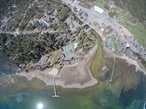 On the west shore, south of Blackwood Creek (shown entering the lake on the right), extensive attached algae growth is visible by the presence of tan areas closest to shore at a depth of 0-2m.