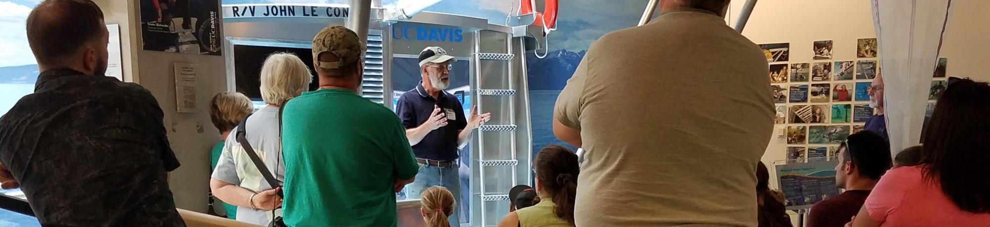 Docent Jim discusses Tahoe with visitors
