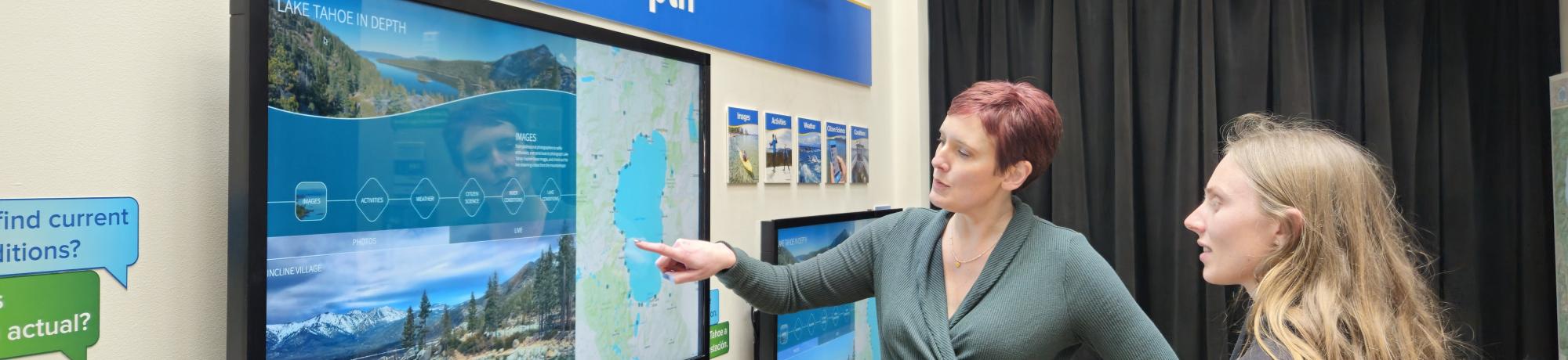 Cara and Mahren examine the features of the Lake Tahoe in Depth Touchscreens